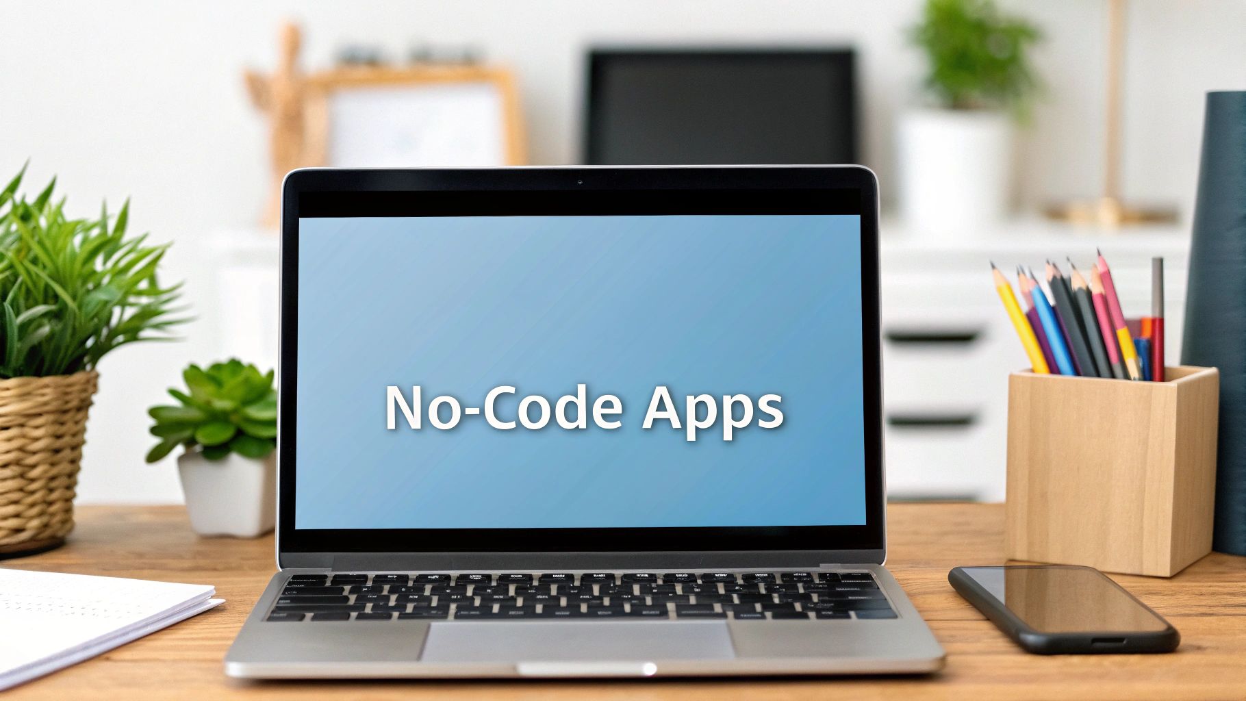 A person sketching a no-code app design on a tablet to build an app without coding, surrounded by floating interface elements and icons.