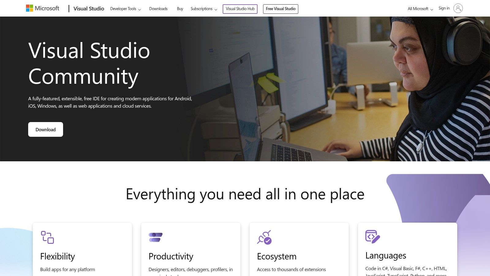 Visual Studio Community IDE with a .NET MAUI project open, showing XAML layout and C# code side by side